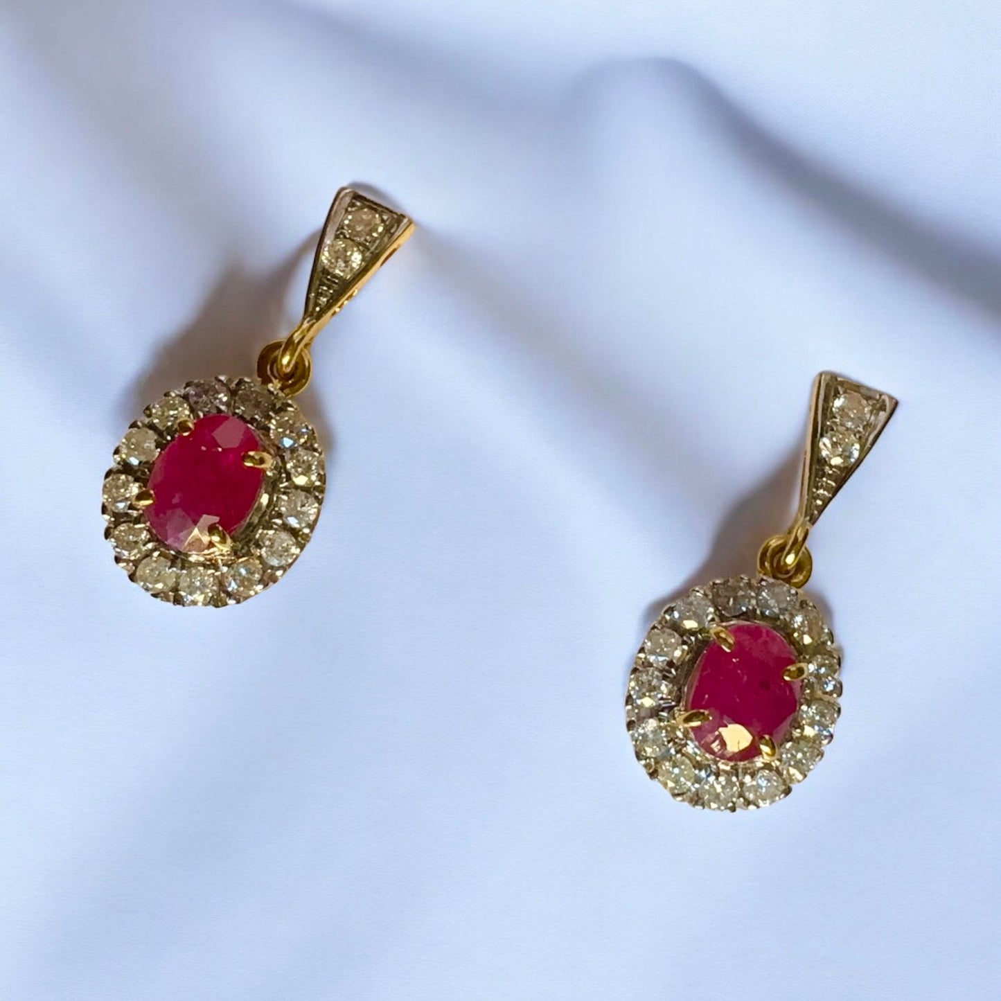 Teardrop style Natural unheated Burmese ruby and natural diamond earrings in 20K solid gold