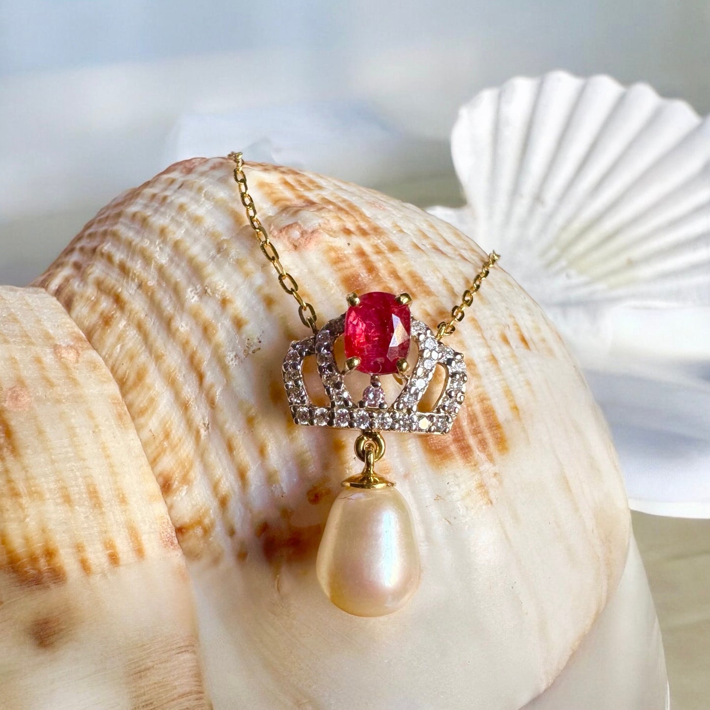 Pendant featuring a combination of Natural Unheated Ruby, South Sea Cultured Pearl and Natural Diamonds in 18K Solid Gold.