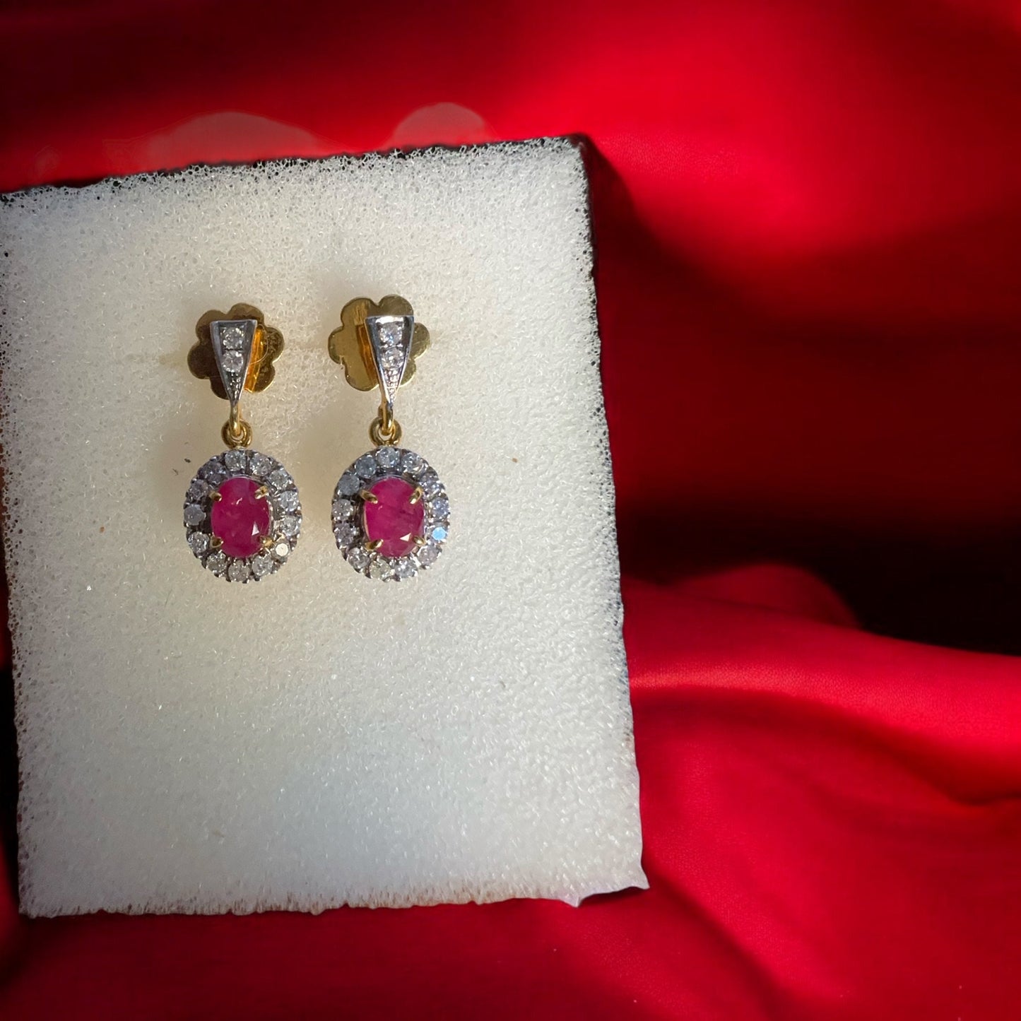 Teardrop style Natural unheated Burmese ruby and natural diamond earrings in 20K solid gold