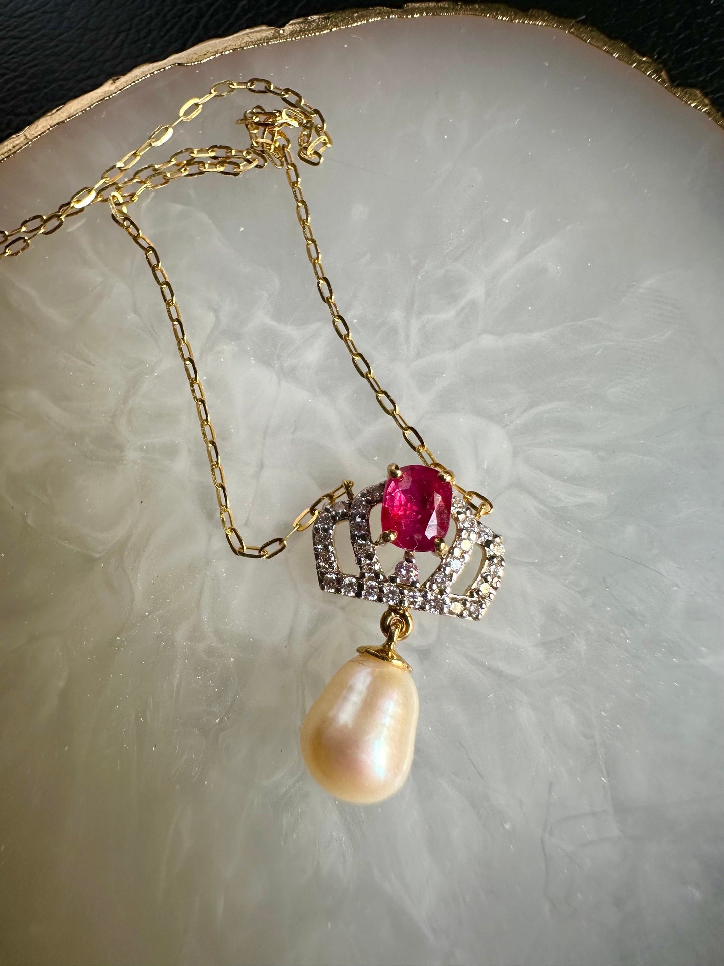 Pendant featuring a combination of Natural Unheated Ruby, South Sea Cultured Pearl and Natural Diamonds in 18K Solid Gold.