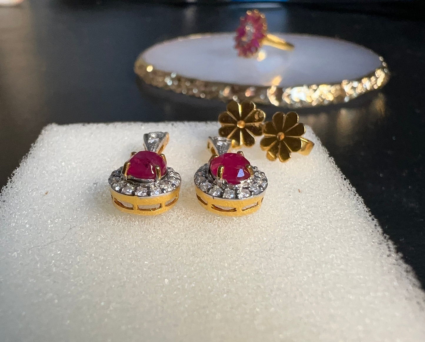 Teardrop style Natural unheated Burmese ruby (2CT) and natural diamond earrings in 20K solid gold